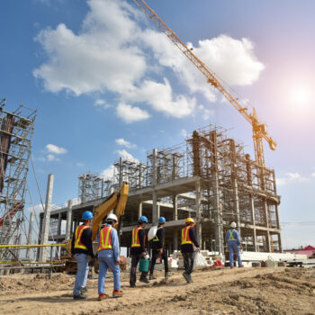Construction Site with Cranes and construction worker
